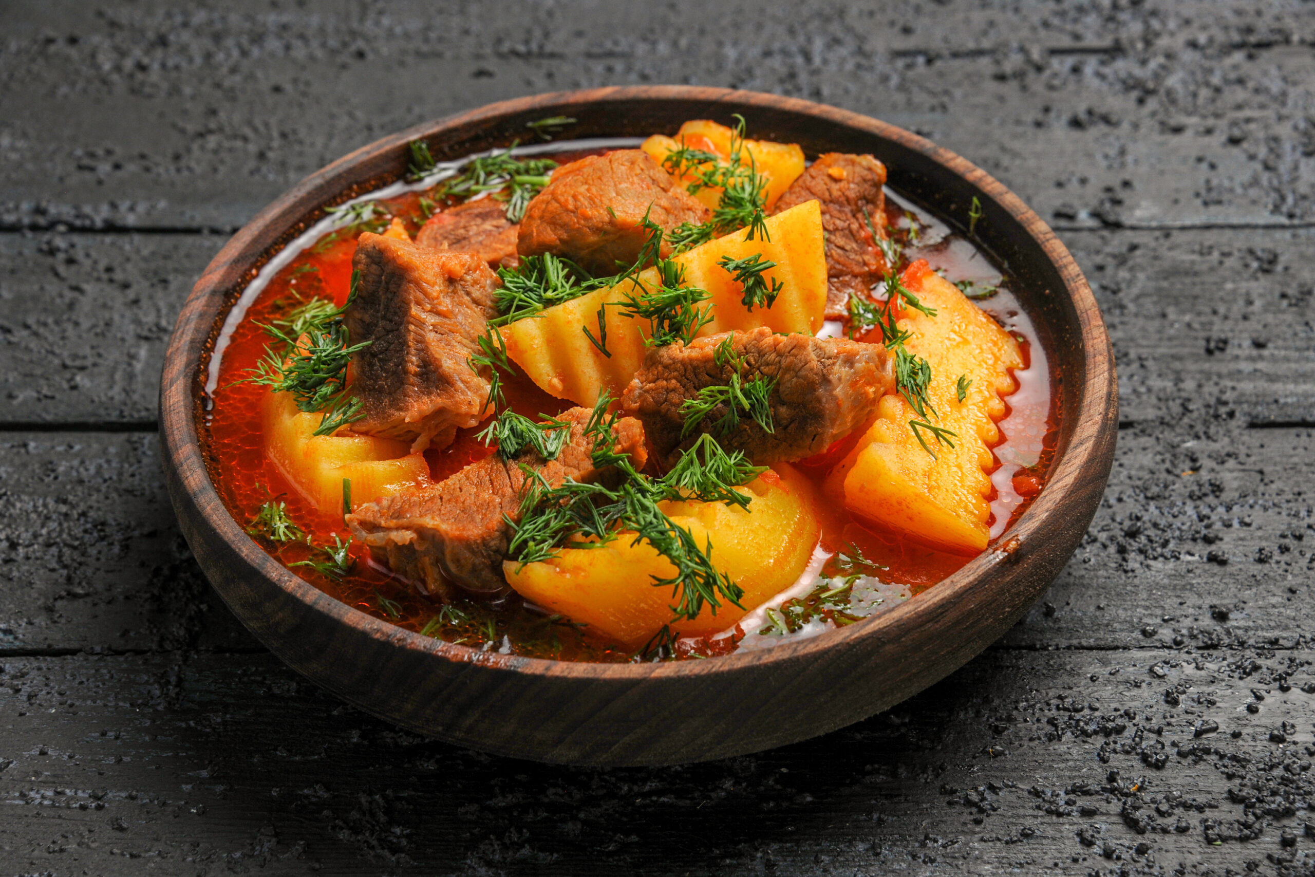 front view tasty meat soup with potatoes greens dark desk meal meat dish sauce